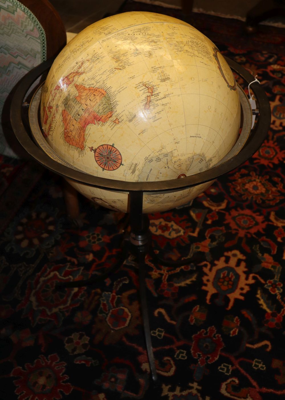 A reproduction 16inch diameter World Classic globe on metal tripod base, H.90cm
